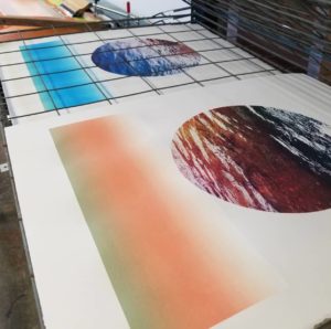 Two colorful pieces of art by Arron Foster
