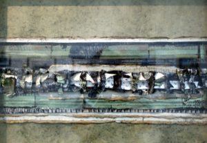 Award-winning collage by Helen Jane Willson features horizontal ribbons of green, white paper, silvery metal.