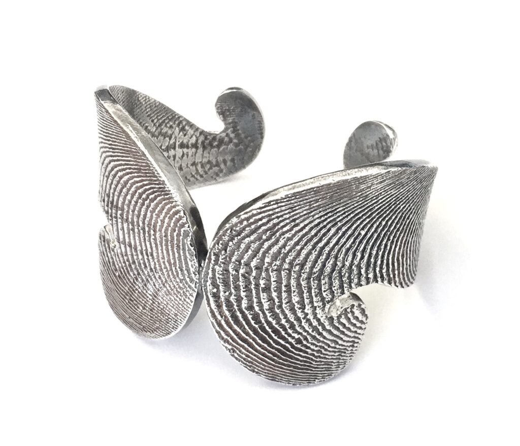 cuttlebone cast cuff bracelet by Krinstina Malcom, Honorable Mention, sterling silver